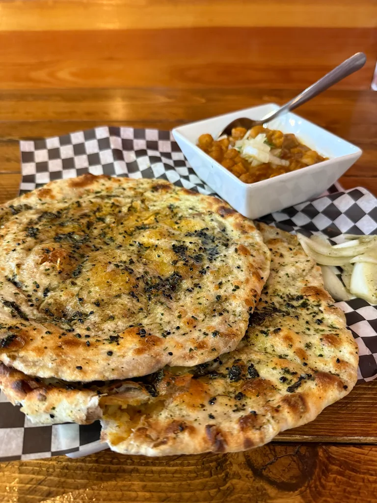 Amritsari Kulcha - tandoori aloo kulcha with chickpea curry at Chatkhara By Krishna in downtown Edmonton, AB